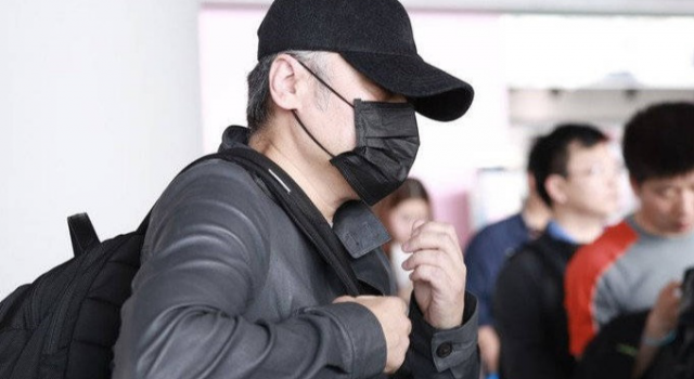 吴秀波现身机场 风波过后 雅痞波叔变成了真大叔