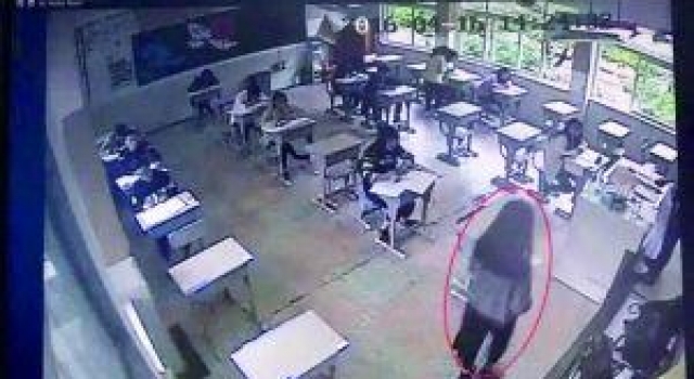 靓丽女大学生替考被发现 牵扯出幕后组织者每人收上万
