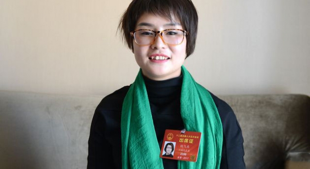 90后女人大代表不断被抹黑 收养弃婴亲子鉴定证清白