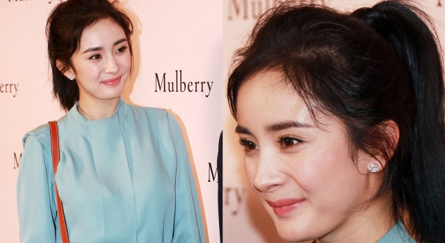 杨幂减龄高马尾再现少女幂 甩袖衬衫知性大方